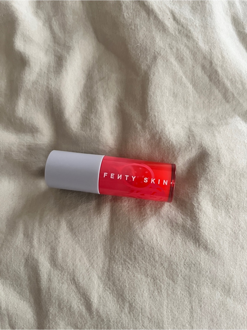 Fenty Beauty Hydrating + Strengthening Lip Oil in “dragon fruit”
